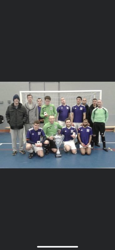 Picture shows Merseyside Blind  Football Club  with their medals and the Brian Aarons Trophy